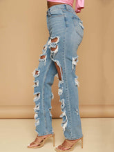 Pantalones vaqueros rasgados de cintura alta y calados